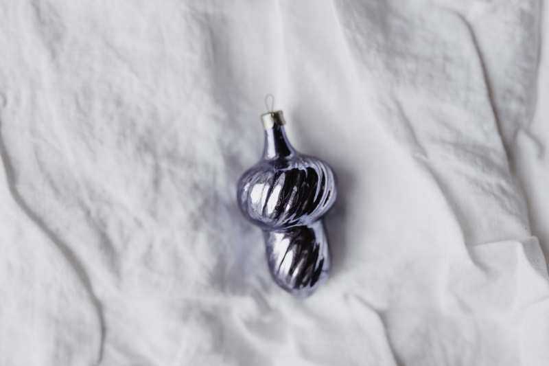 bed, single object, high angle view, pantone, ornaments, christmas, emotion, selective focus, still life, studio shot, no people, softness, 5K, purple