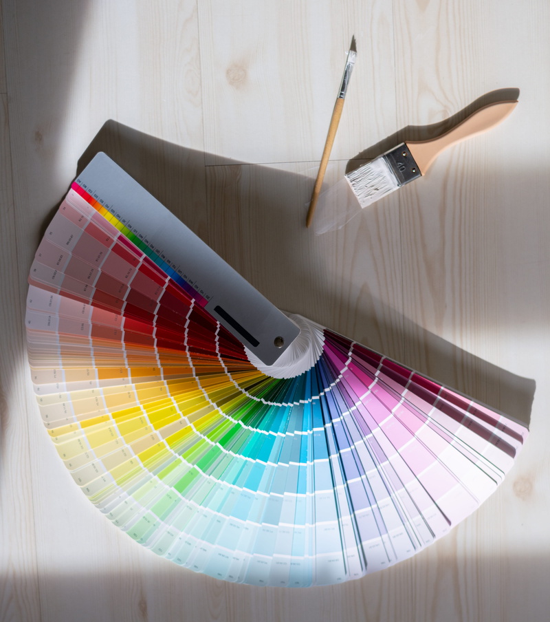 text, rainbow, accuracy, color swatch, screen, light, wood - material, advertisement, tabletop, choice, electronics, close-up, poster, writing instrument