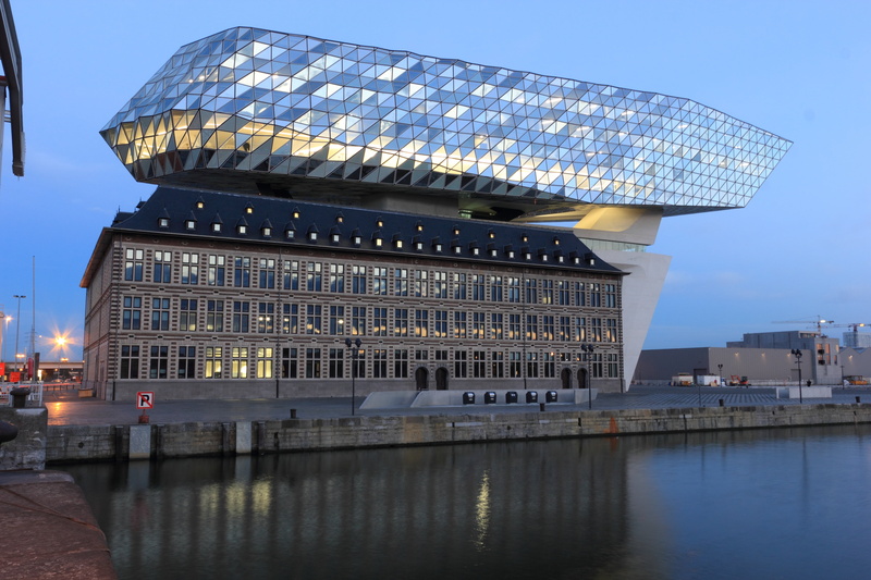 built structure, clear sky, office, building exterior, travel, building, architecture, port house, waterfront, day, tourism, river, design, antwerp, sky