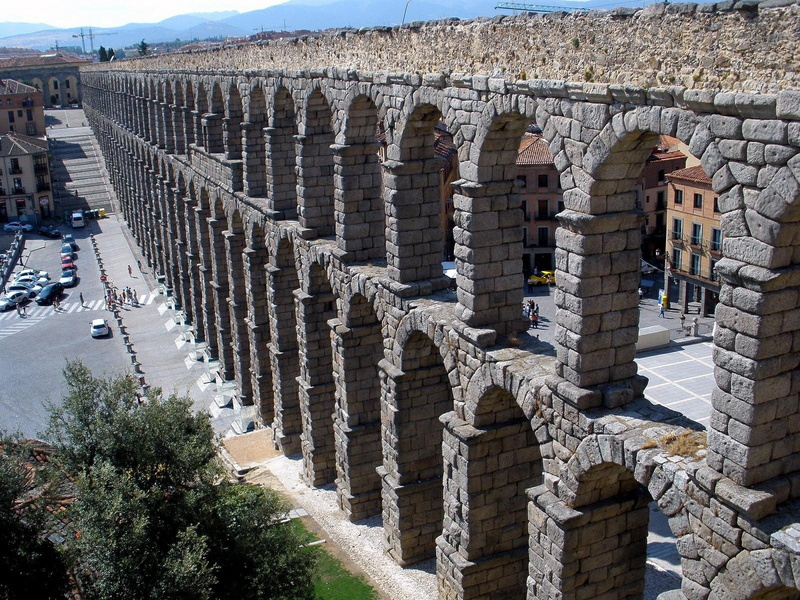 landmark, segovia, the past, historical, building exterior, architectural column, sunlight, architecture, archaeology, history, high angle view, travel destinations