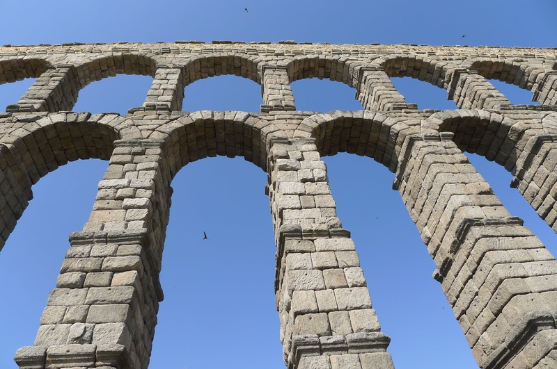 spanish, low angle view, outdoors, travel, no people, aqueduct, archaeology, travel destinations, nature, segovia, day, ruined, ancient, clear sky, history