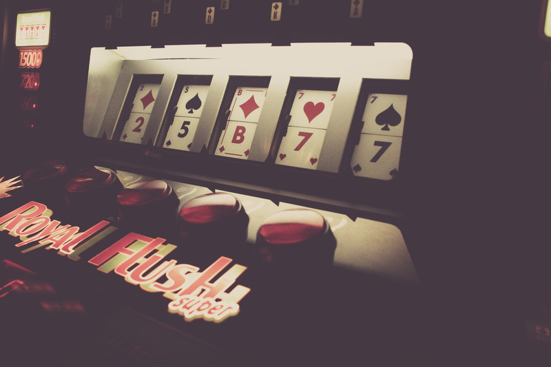 number, arts culture and entertainment, button, leisure games, western script, text, gambling, high angle view, close-up, machine, game of chance, alphabet