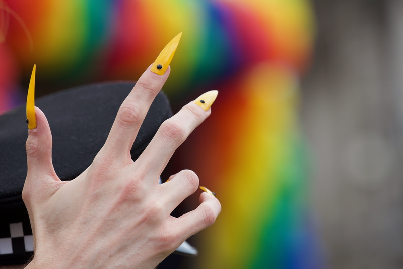 wall - building feature, communication, holding, adult, dom, nail polish, uk, human hand, england, lgbt, close-up, midlands, tourism, finger, activism