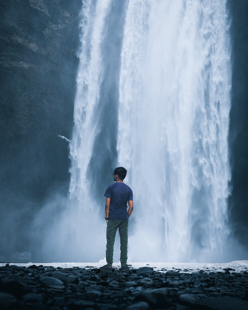 leisure activity, men, rocks, panoramic, casual clothing, outdoors, rainfall, motion, long exposure, looking at view, rear view, beauty in nature, water crystal