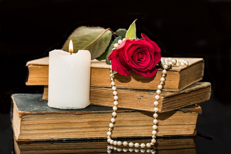white, fragility, black background, vulnerability, old, wood - material, pearl necklace, flowering plant, freshness, no people, light, tied up, near, container