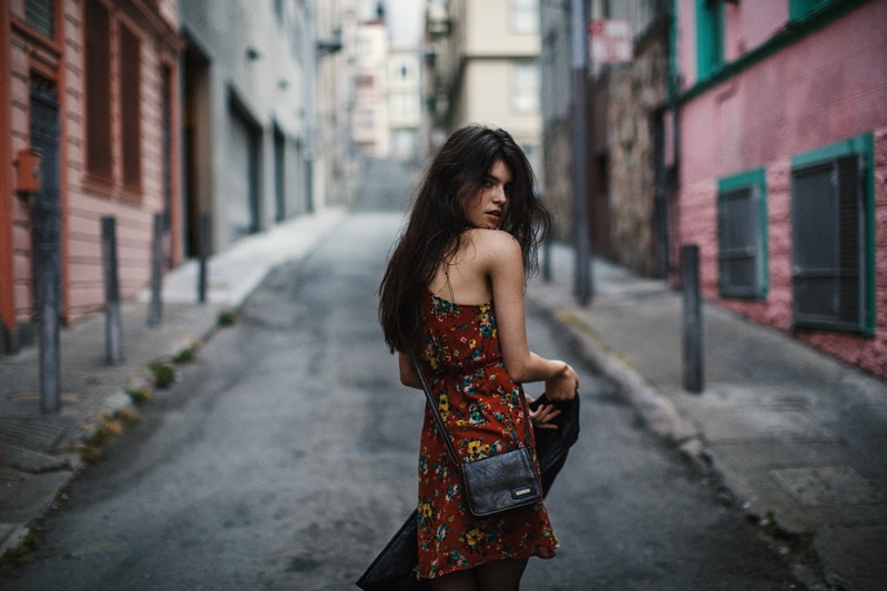 outdoors, street, women outdoors, hair, focus on foreground, one person, women, purses, architecture, Jesse Herzog, built structure, beauty, young adult