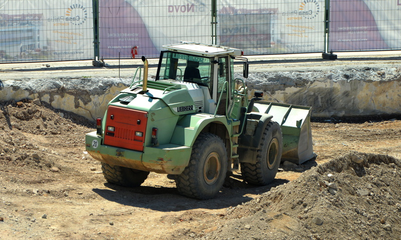 land vehicle, heavy appliance, mode of transportation, planning, construction site, nature, profile, outdoors, civil engineering, urban planning, day, built structure