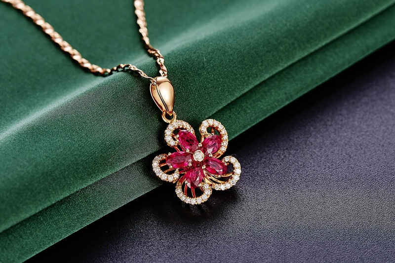gold colored, still life, close-up, red, no people, necklace, plant, day, green color, fashion, indoors, colored, flower, high angle view, 2K, gemstone