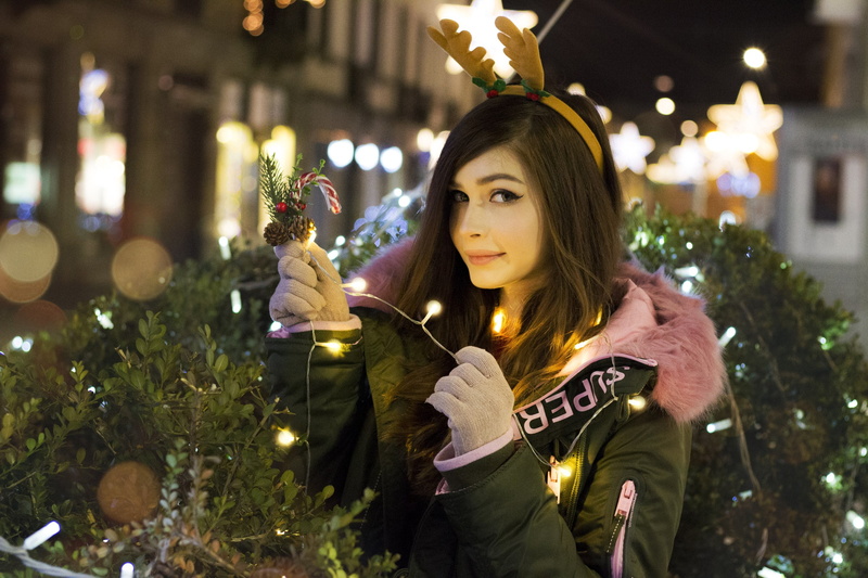 holiday, women outdoors, night, portrait, focus on foreground, decoration, white gloves, lifestyles, brunette, green jacket, celebration, christmas, Karina Kozyreva
