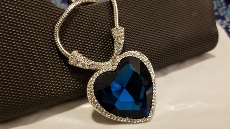 day, no people, personal accessory, close-up, wealth, ocean heart, car, jewellery, transportation, jewelry, still life, blue, focus on foreground, outdoors