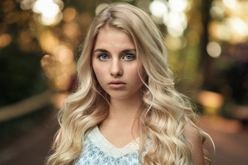 front view, teenager, focus on foreground, Martin Kühn, long hair, one person, looking at camera, girls, hair, beautiful people, beautiful woman, contemplation
