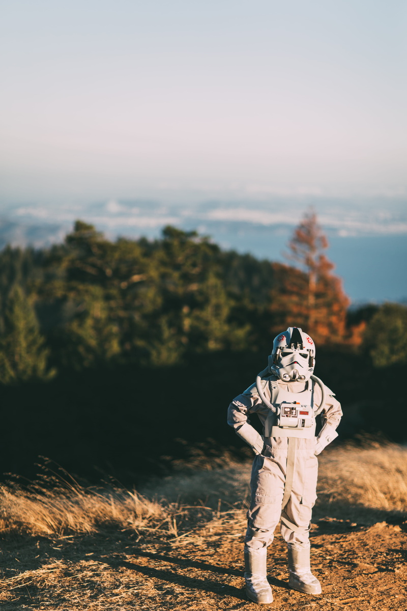 stormtrooper, caucasian Ethnicity, focus, field, costume, sky, leisure activity, background, child, young adult, front view, trees, land, adults only, photography