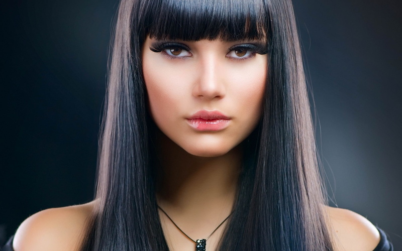 hairstyle, beauty, beautiful people, dark hair, indoors, beautiful woman, headshot, bangs, necklace, black background, body part, black hair, hair, long hair