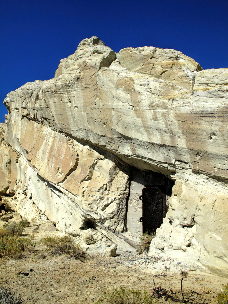 travel destinations, mountain, natural, outdoor, geology, stone, low angle view, eroded, sky, bullet holes, desert, mine shaft, non-urban scene, outdoors