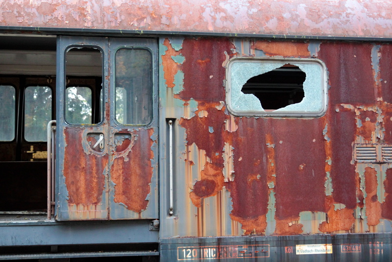 hole, architecture, built structure, wagon, mode of transportation, no people, retired, day, train, stainless, old, weathered, land vehicle, shard, railway carriages