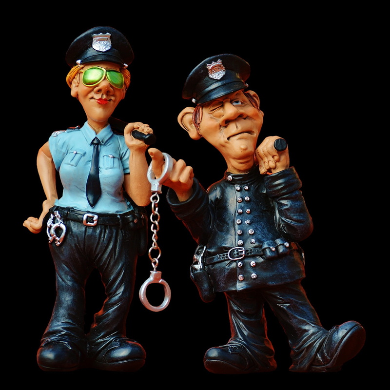 handcuffs, police, black background, looking at camera, males, figure, government, funny, two people, family, mature adult, fun, men, baton, 1080P, indoors