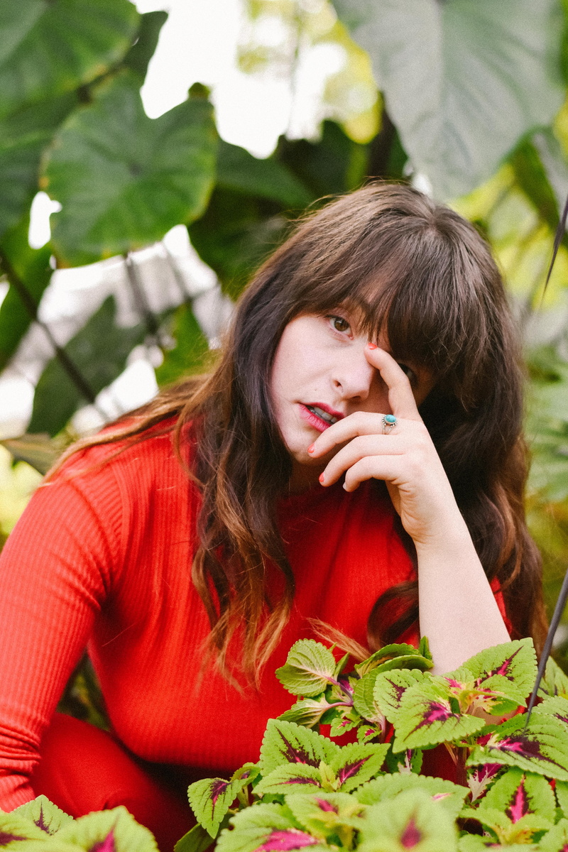 holding, conservatory, wistful, flower, green, green Color, cheerful, model, moody, plant, gardening, 5K, casual Clothing, caucasian Ethnicity, happiness