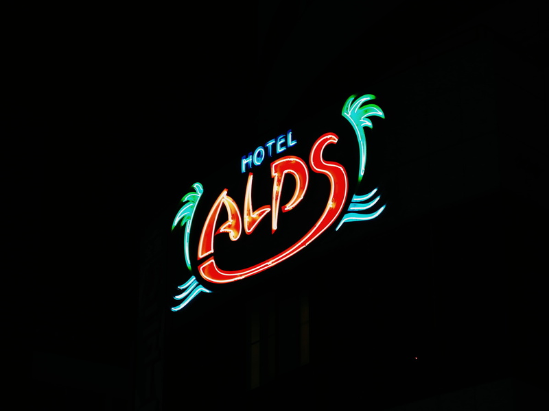 food, food and drink, glowing, trademark, text, metropolis, information, machine, commercial sign, stage, neon, sign, urban, copy space, led, motel, alps