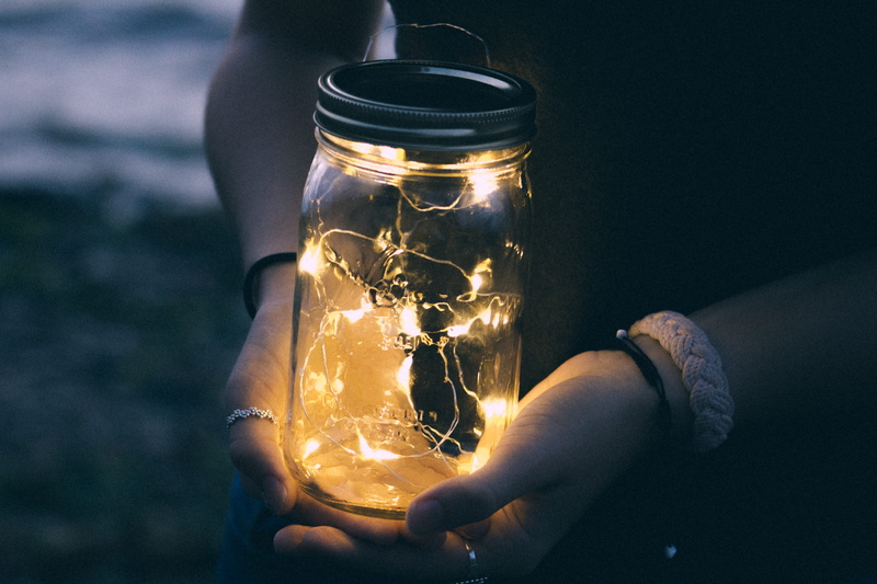 one person, fireflys, beach, human body part, moody, light, mason jar, hand, lifestyles, close-up, burning, glass - material, glowing, lighting equipment