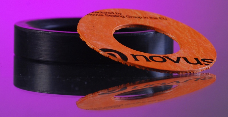 studio shot, indoors, no people, pink color, single object, black color, still life, blue, pink background, high angle view, two objects, orange color