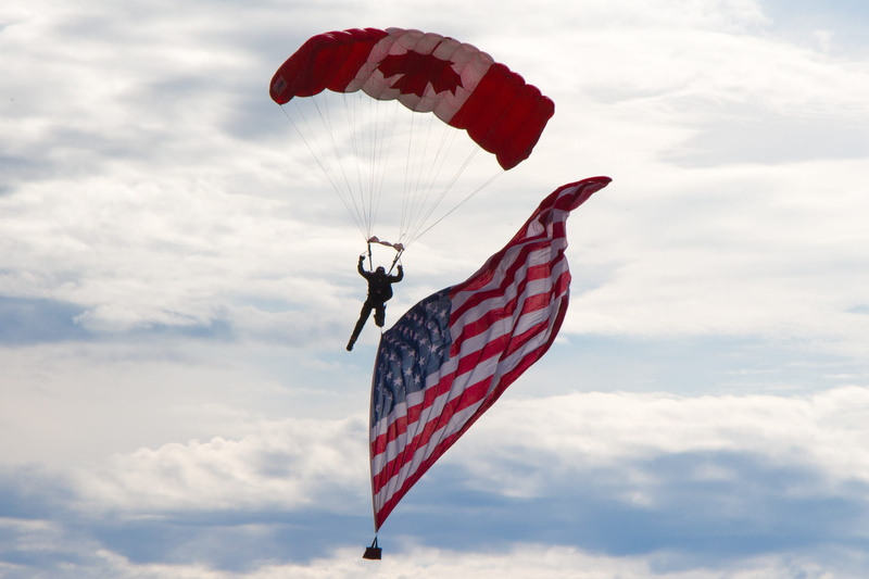 white, parachute, midair, canadian, sport, banner, leisure activity, cloud, day, wetaskiwin, skydiving, usa, patriot, low angle view, brotherhood, dom