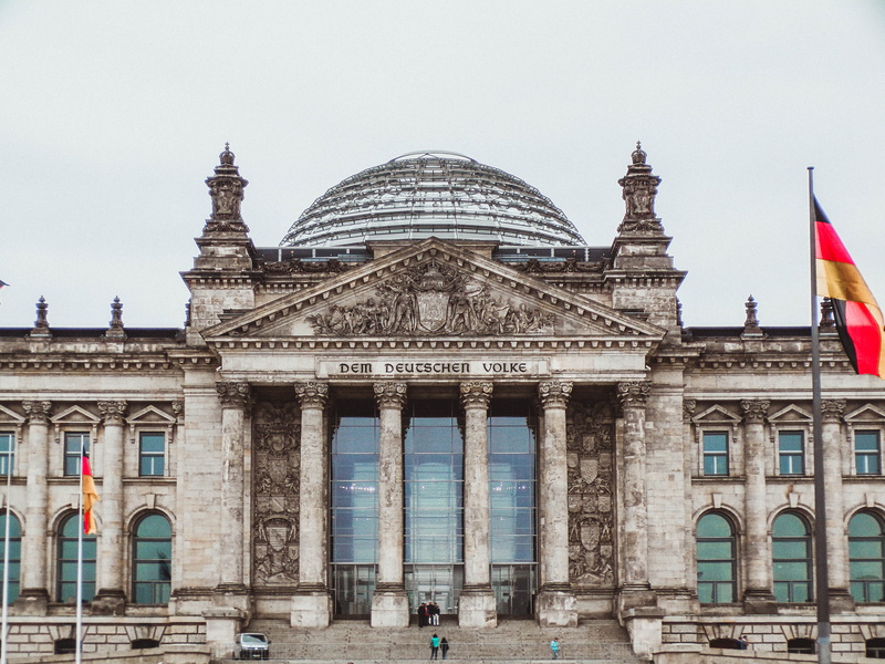 day, architectural column, outdoors, tourism, building, built structure, reichstag building, travel destinations, berlin, columns, facade, exterior, incidental people