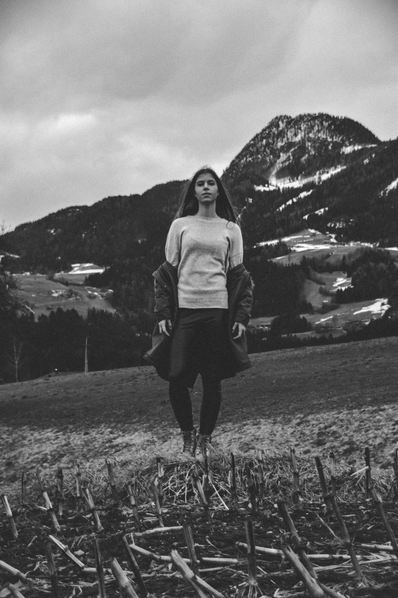 black and white, land, women, lifestyles, young adult, modeling, leisure activity, looking at camera, field, casual clothing, front view, environment, 5K
