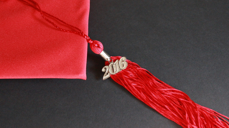 studio shot, close-up, jewelry, hat, ribbon, 5K, academic, fashion, human body part, red, necklace, single object, emotion, tassel, copy space, personal accessory