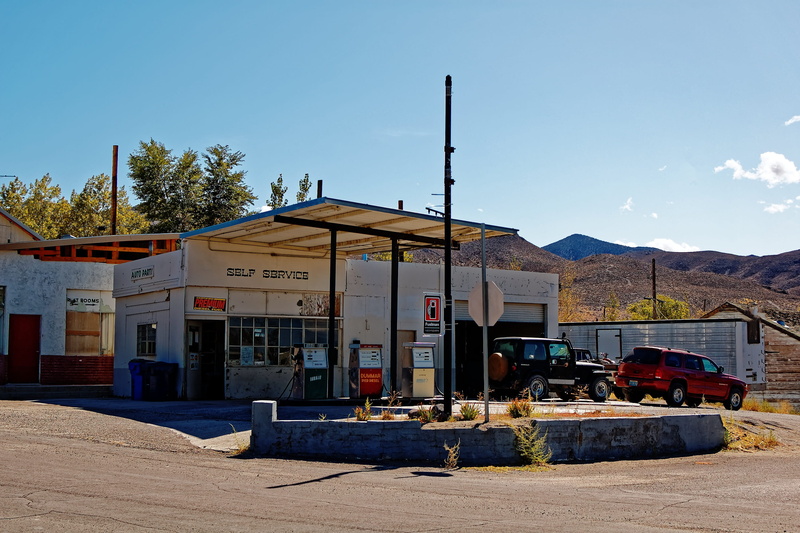 outdoors, Desert, clear sky, day, blue, building, travel, motor vehicle, tree, sky, allows, no people, building exterior, petrol stations, mountain, transportation