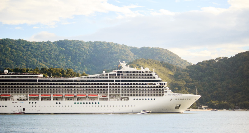 mountain, nautical vessel, sky, daylight, cruise, outdoors, no people, mode of transportation, ocean cruise, built structure, beauty in nature, day, sea