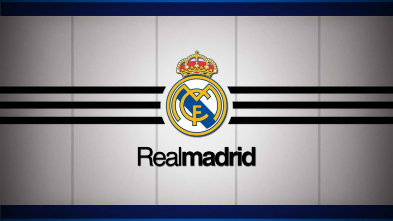 number, wall - building feature, capital letter, text, human representation, close-up, symbol, Real Madrid C.F., indoors, pattern, no smoking sign, transportation