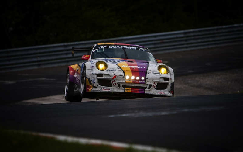 land vehicle, racecar, toy, headlight, auto racing, retro styled, selective focus, road, outdoors, car racing porshe 911 gt3 nurburgring, sport, city, motor vehicle