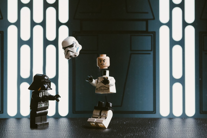 close-up, minifigure, wars, figurine, 4K, text, plastic, electric lamp, male likeness, representation, architecture, figure, lego, indoors, day, stormtrooper