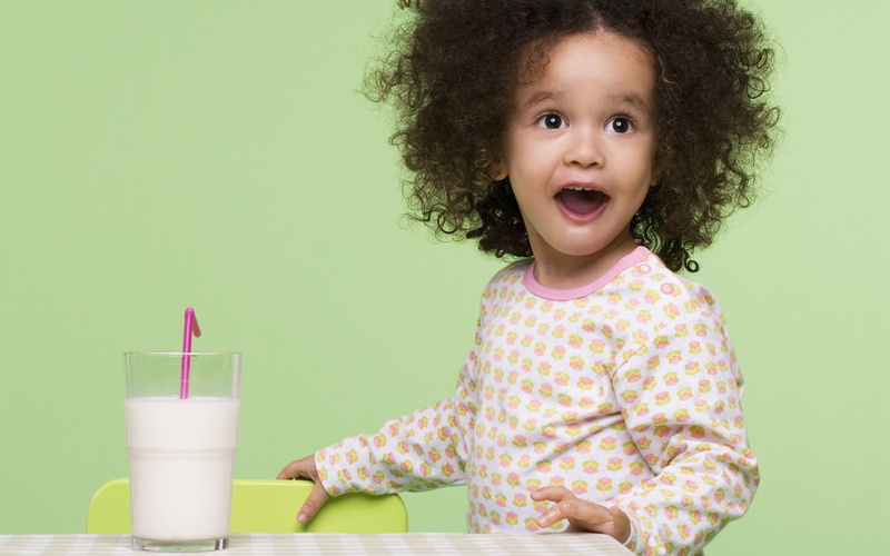 one person, glass, looking at camera, girls, s, footie, women, food and drink, mouth open, hairstyle, girl, refreshment, straw, toddler, innocence, yellow