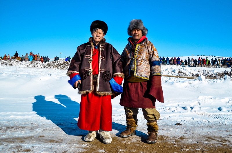 clothing, portrait, lifestyle, snows, snow, standing, mongolian, man, front view, winter, men, traditional, two people, smiling, near, nature, cold temperature