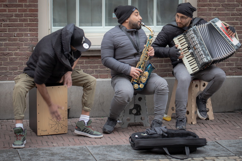 amsterdam, sax, guitar, group of people, clothing, apparel, leisure activities, footwear, young men, indoors, interior design, architecture, casual clothing