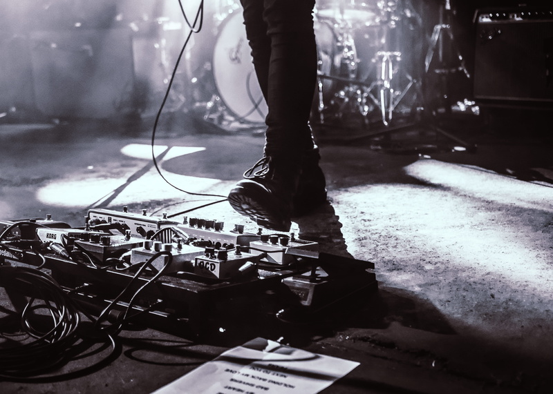 Concert, standing, low section, men, arts culture and entertainment, musical instrument, stage - performance space, popular music concert, 4K, focus on foreground