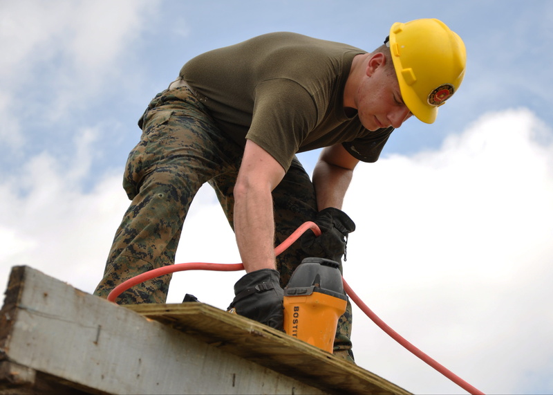 person, building, day, occupation, mid adult, male, nature, roof, working, construction site, one person, tool, construction, one man only, real people