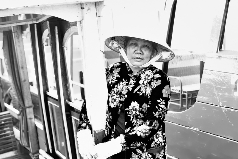 casual clothing, standing, one person, person, wanderlust, asian, looking at camera, three quarter length, sun hat, mekong, documentary, hat, photo, greyscale