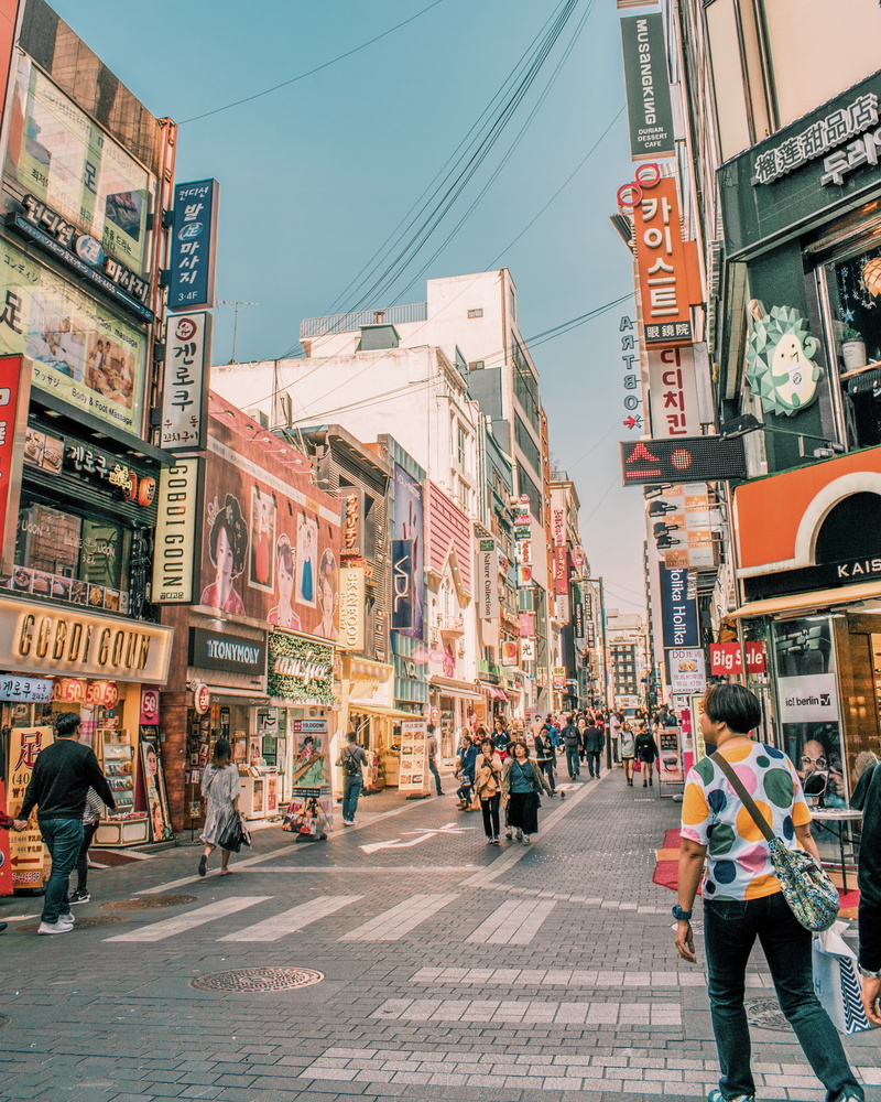 downtown District, urban, shop, travel, person, editorial, retail, building Exterior, cityscape, tourist, built Structure, colorful street, pedestrian