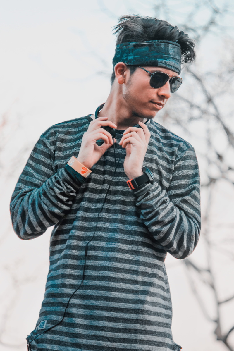 ]posing, hat, apparel, lifestyles, casual clothing, photography, young adult, sunglasses, clothing, real people, man, human, wearing, person, outdoors