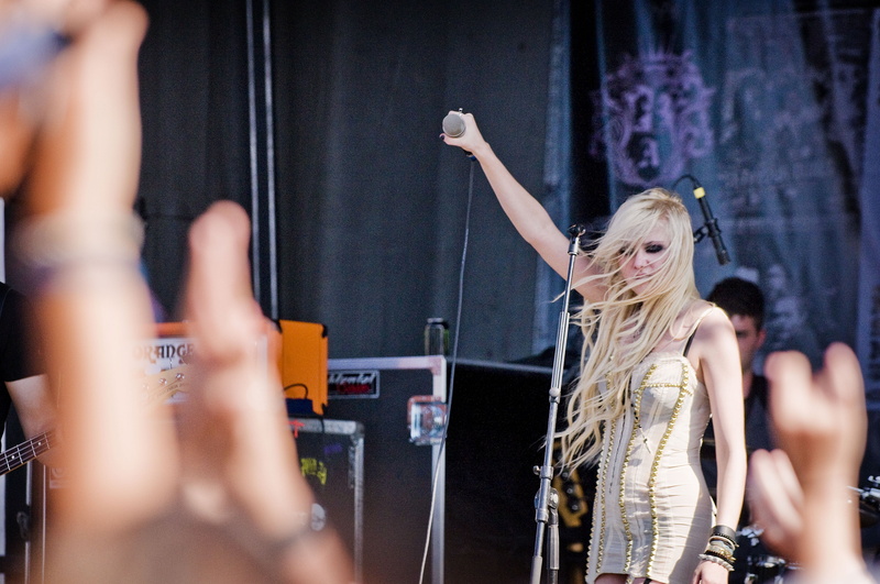 photography themes, The Pretty Reckless, women, focus on background, adult, stage, arts culture and entertainment, dress, real people, singer, s, arms raised