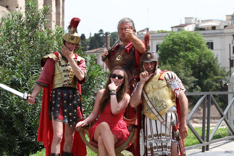 Tourism, real people, gladiators, bizarre, architecture, Colosseum, building exterior, people, lifestyles, clothing, young adult, built structure, Legionnaires