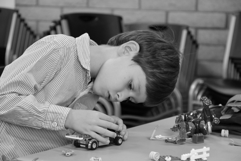 plastic, leisure activity, build, lego, button, real people, pinstriped, casual clothing, wearing, childhood, fun, child, boys, looking, innocence, indoors