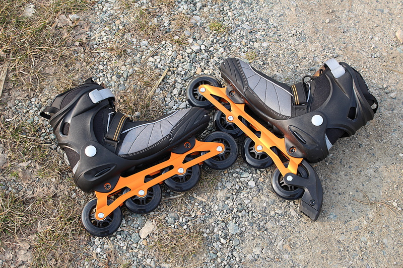 day, outdoors, still life, the past, gun, airplane, history, black color, roller skates, equipment, transportation, mode of transportation, shoe, no people