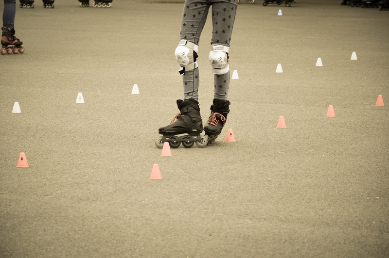 rollerblading, body part, real people, inline, leisure activity, human limb, outdoors, playing, day, person, rollerskating, motion, rollerblades, childhood