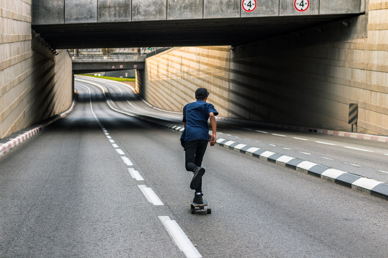 full length, real people, road, rear view, leisure, built structure, rollerskater, young, dance, skating, teenager, sunset, skateboard, one person, rollerskating