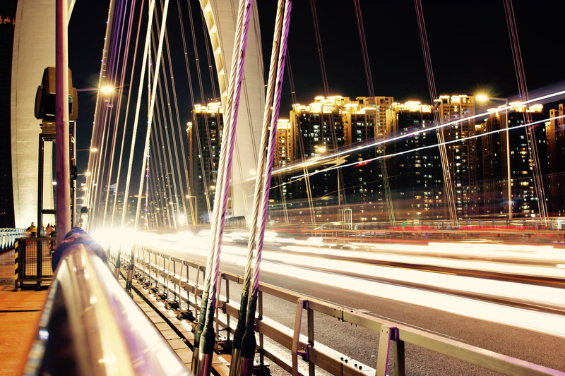 city life, light trail, built structure, architecture, land vehicle, outdoors, blurred motion, traffic, speed, no people, guangzhou shi, liede bridge, illuminated