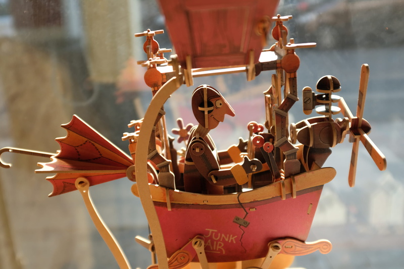 outdoors, nautical vessel, toy, 2K, no people, guangzhou shi, enning road, close-up, representation, background, human representation, day, creativity