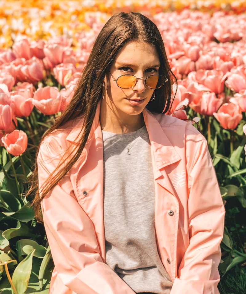 photo, one person, eyes, field, young adult, casual, young women, daytime, real people, hairstyle, beauty, woman, posing, facial expression, pink flowers